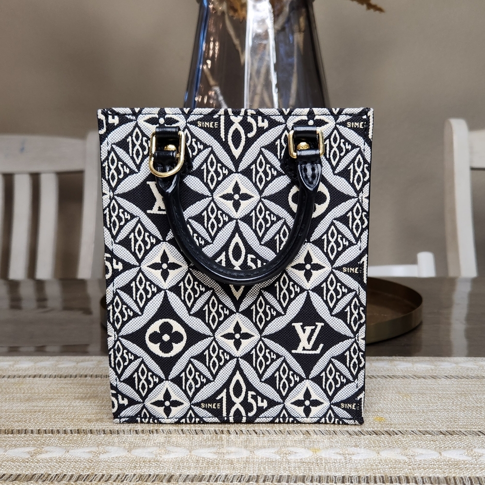LOUIS VUITTON 
Jacquard Since 1854 Petit Sac Plat Grey